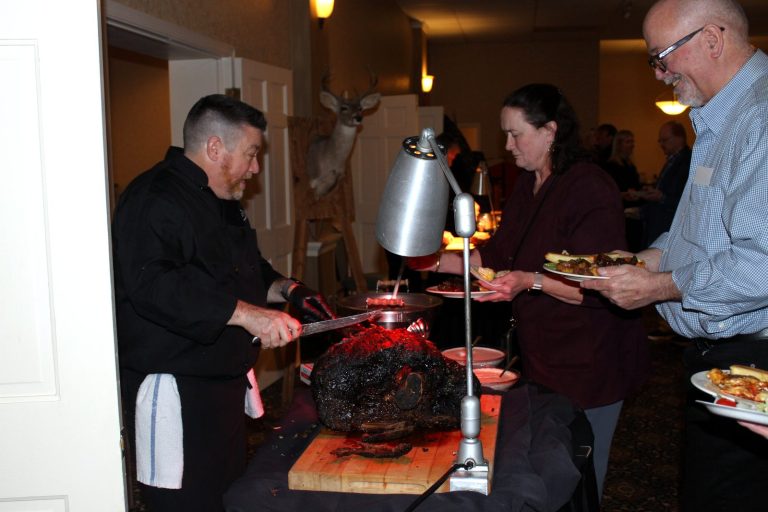 Guests served at the carving station of the wild game dinner at the 2026 Night of the Hunter