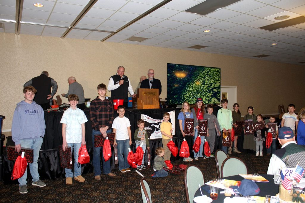 Young hunters lined up for the youth giveaway at Night of the Hunter